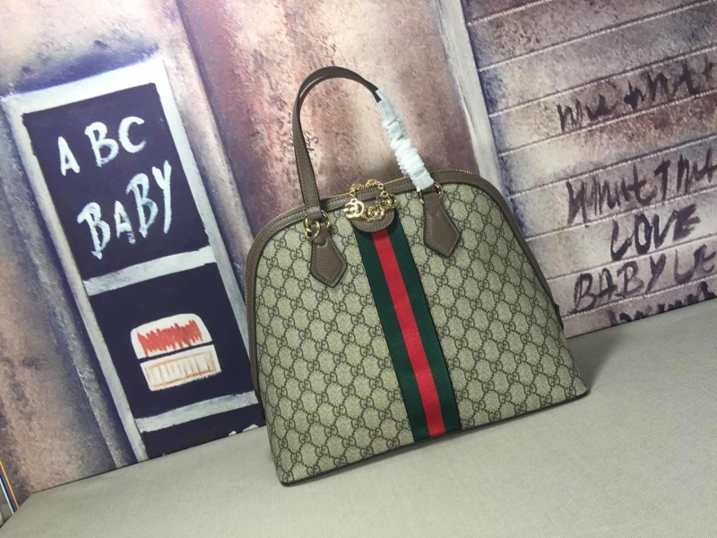 G*u*i top handle bags